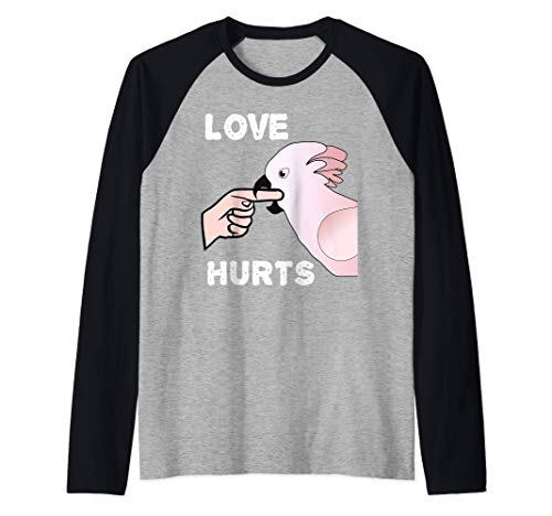 El amor duele Molucas Cacatúa Loro Mordedor de Dedos Camiseta Manga Raglan